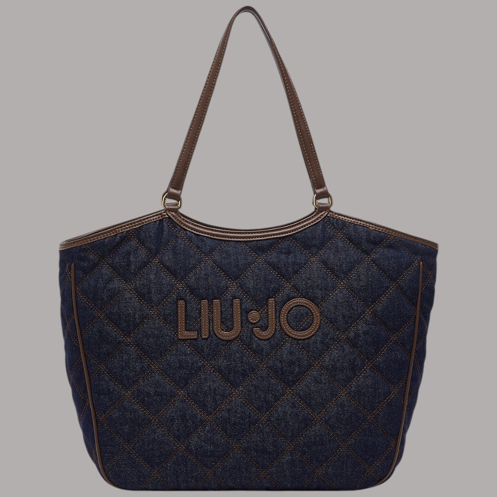 Borsa tote grande in denim matelassé blu con manici e zip, motivo a rombi