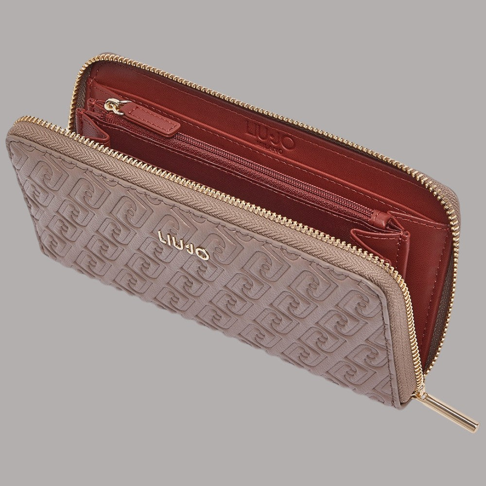 Portafoglio grande goffrato monogramma con interno bordeaux e zip dorata