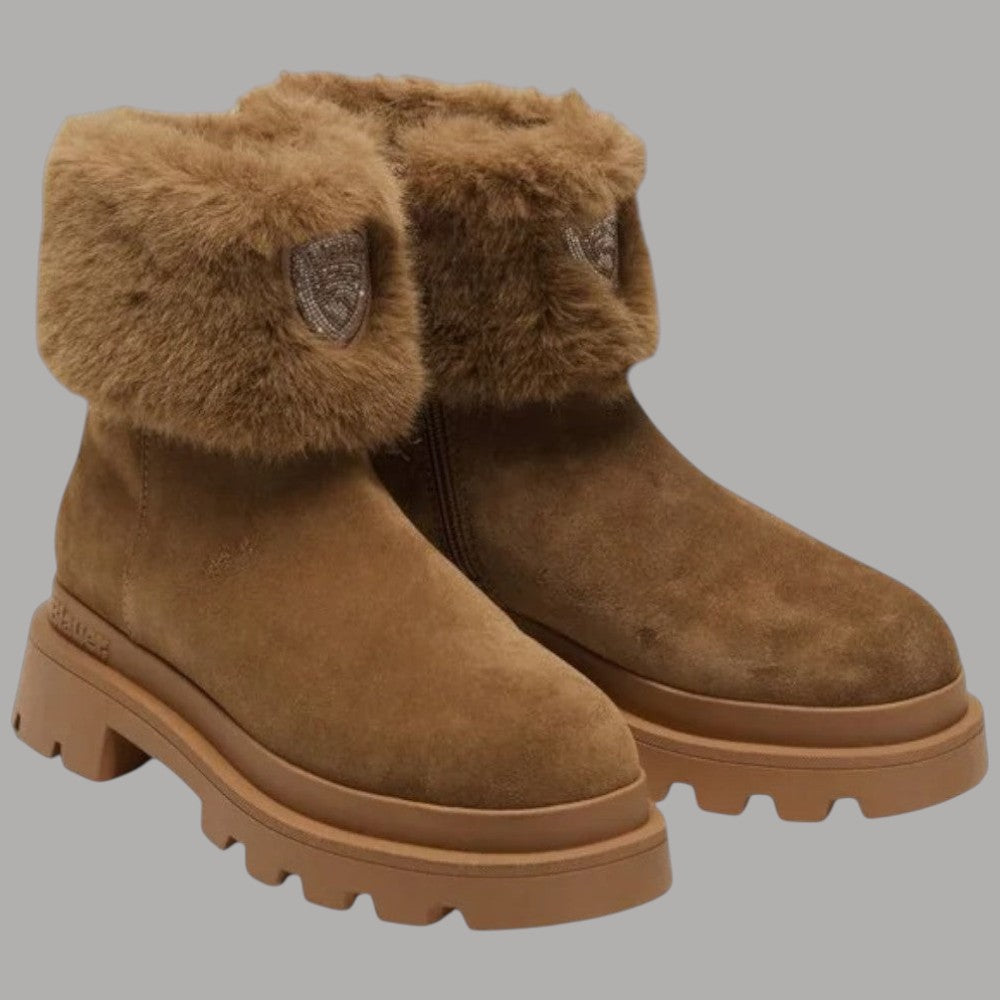 Stivaletti in suede cognac con bordo in pelliccia e suola dentellata