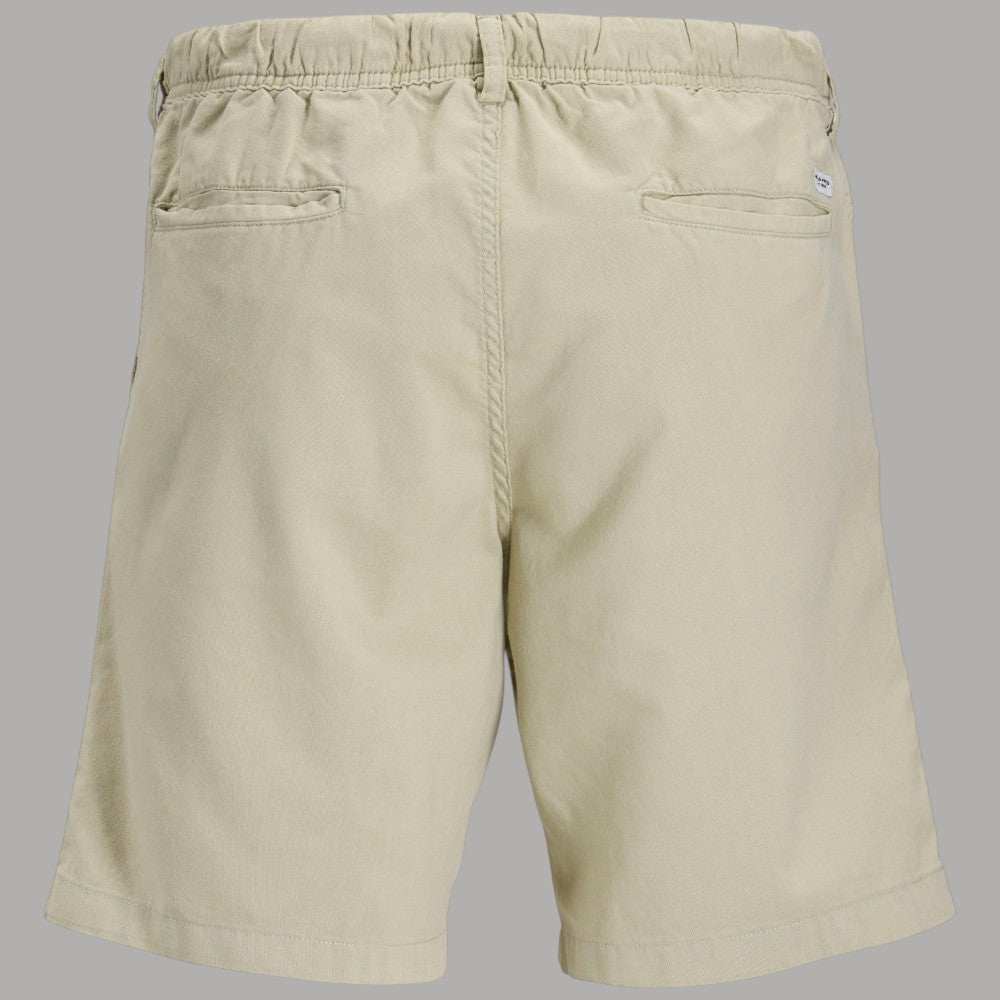 Bermuda in canvas beige con elastico in vita e coulisse, tasche posteriori.