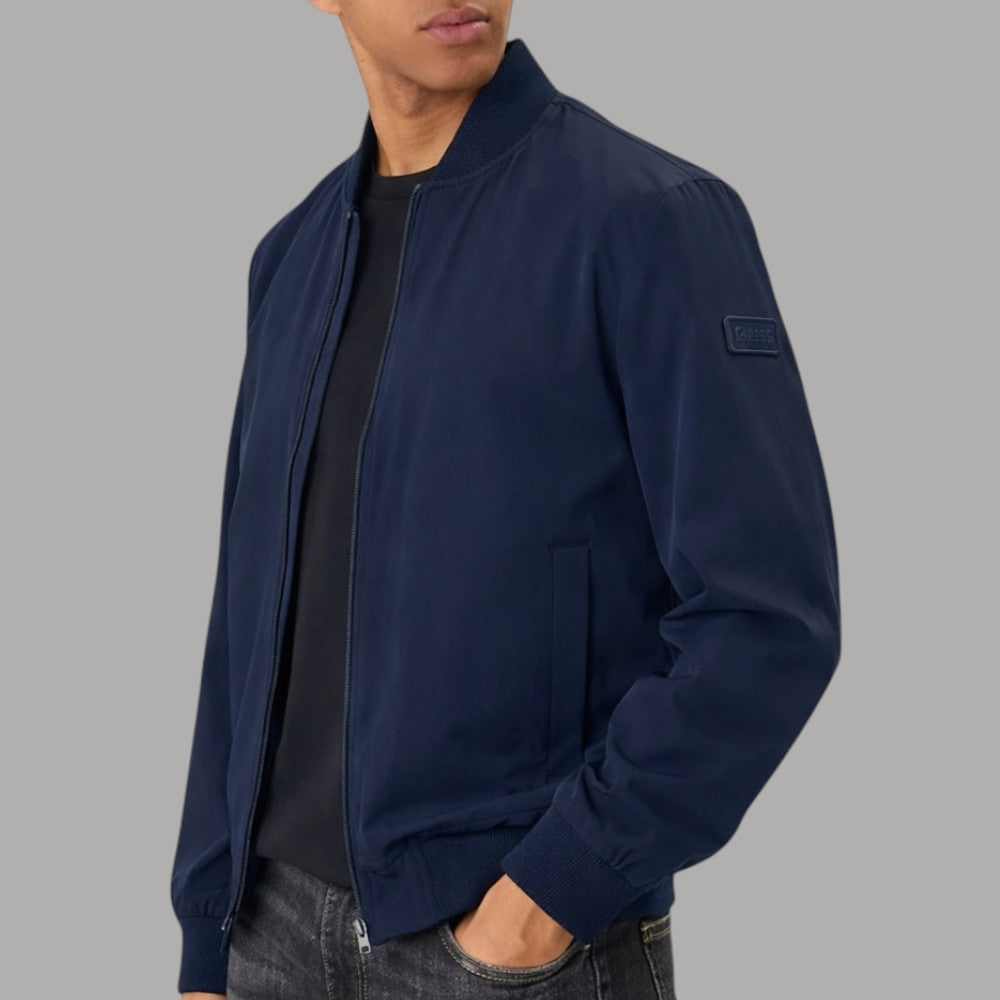 Giacca bomber blu con tasca frontale e logo sul petto