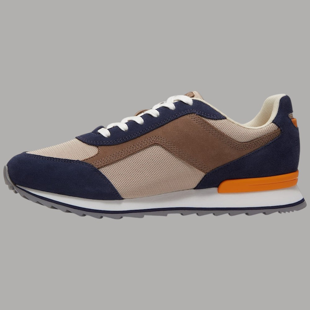 Sneaker Timberland vista laterale beige e blu scuro, suola bianca con dettaglio arancione