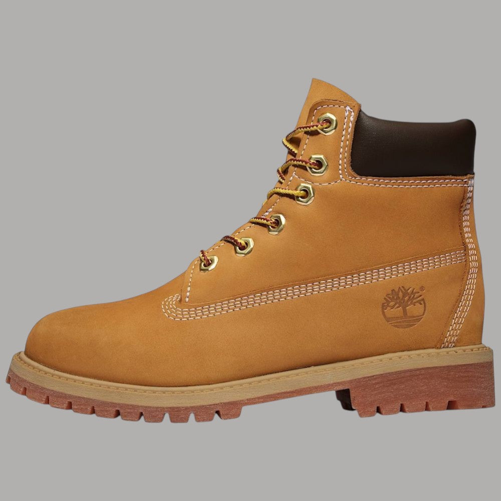 Stivale impermeabile junior giallo con lacci e logo sul lato, colletto scuro.