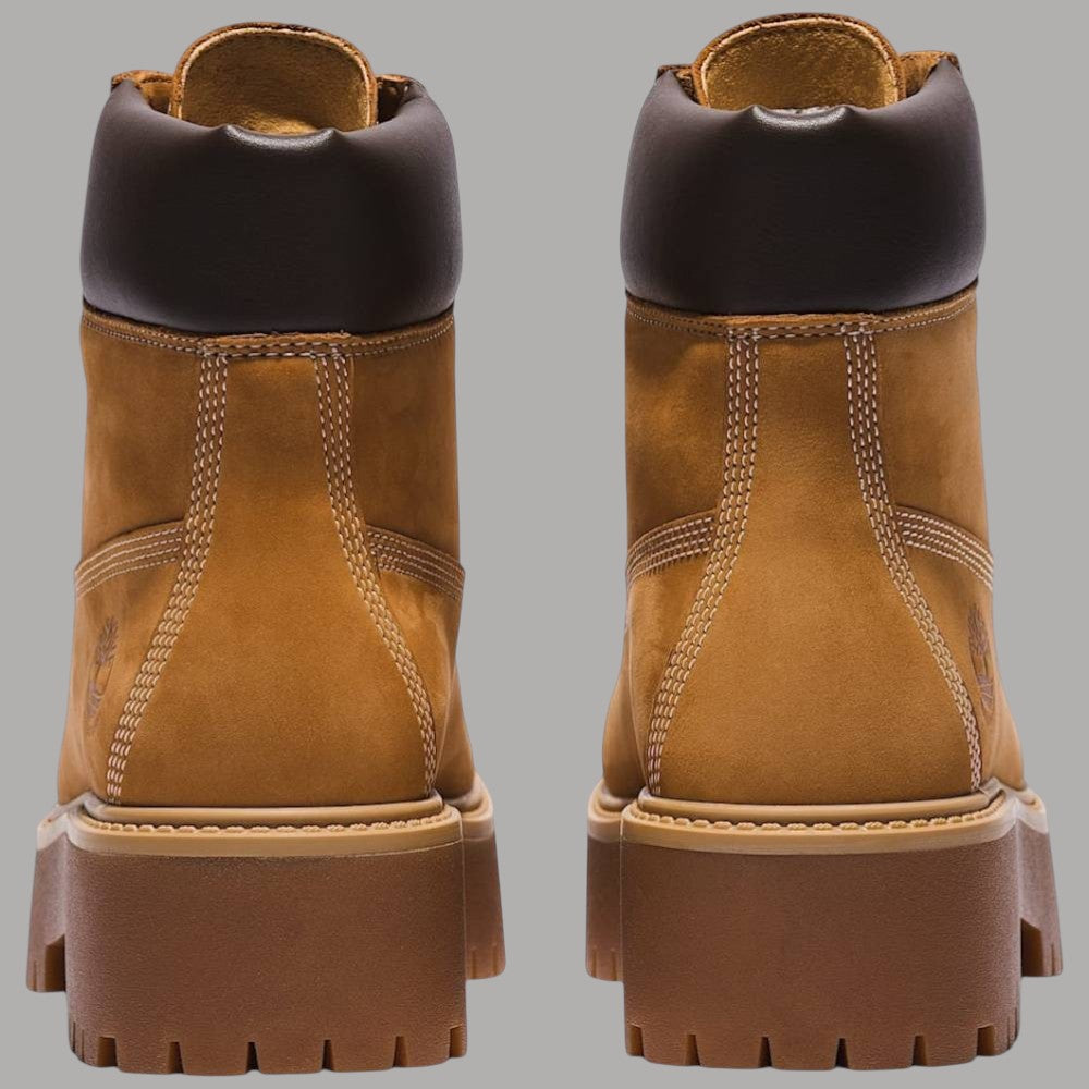 Stivale donna impermeabile giallo, retro con inserti scuri e suola plateau scanalata