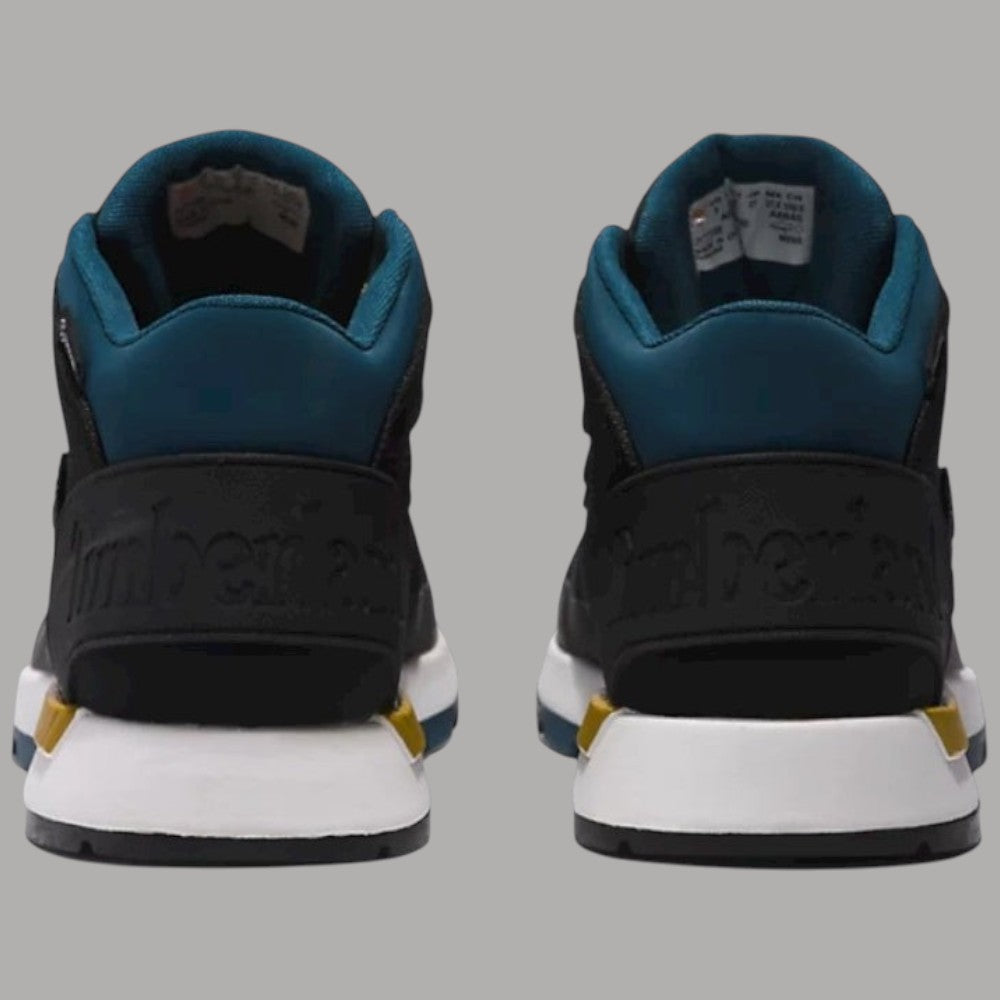 Scarpe Timberland uomo viste da dietro: collar blu, pannello nero e suola bianca
