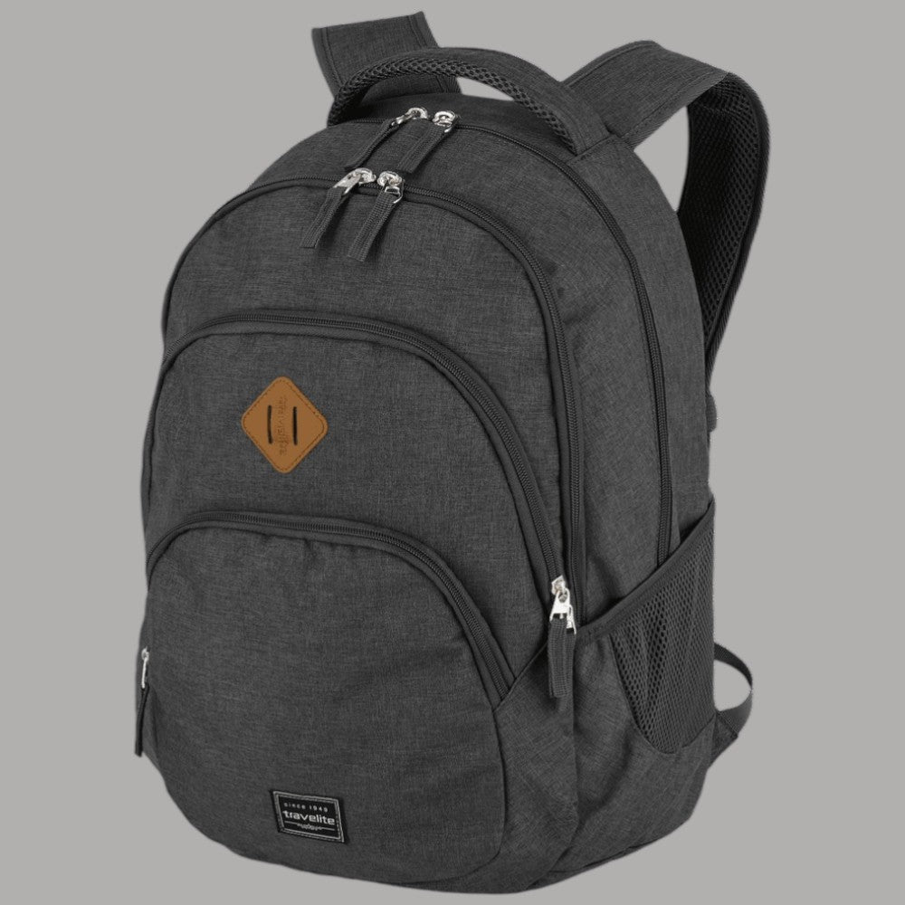 Zaino Travelite melange grigio scuro, tasca anteriore con zip e spallacci imbottiti.
