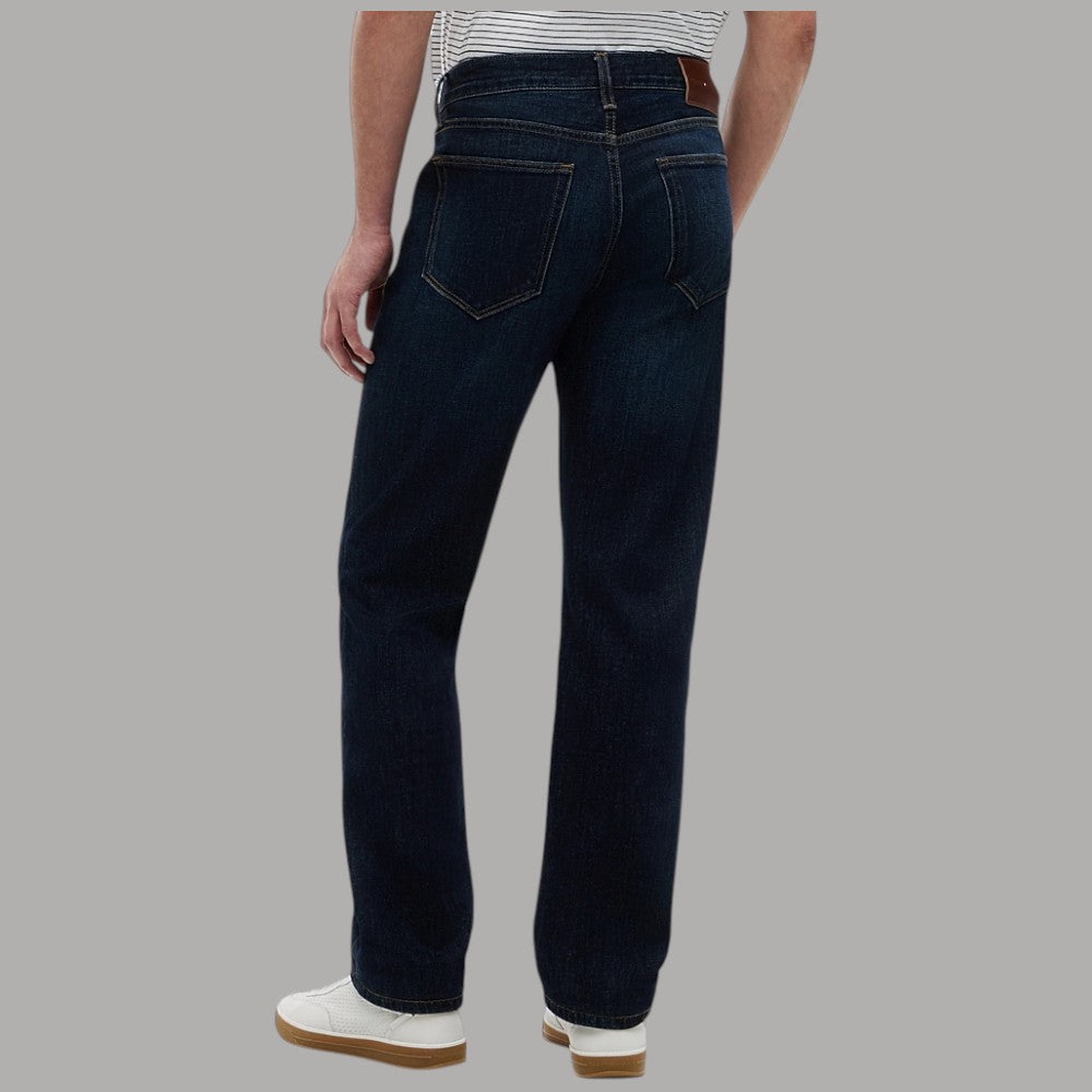 Tommy Hilfiger jeans slim dritti blu scuro con cuciture contrasto e dettagli in pelle sul retro