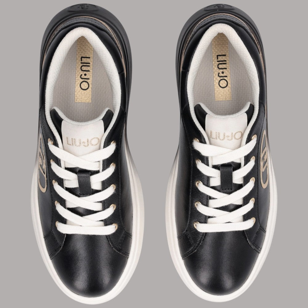Scarpe da ginnastica nere con interno grigio, lacci bianchi e scritta LIU•JO