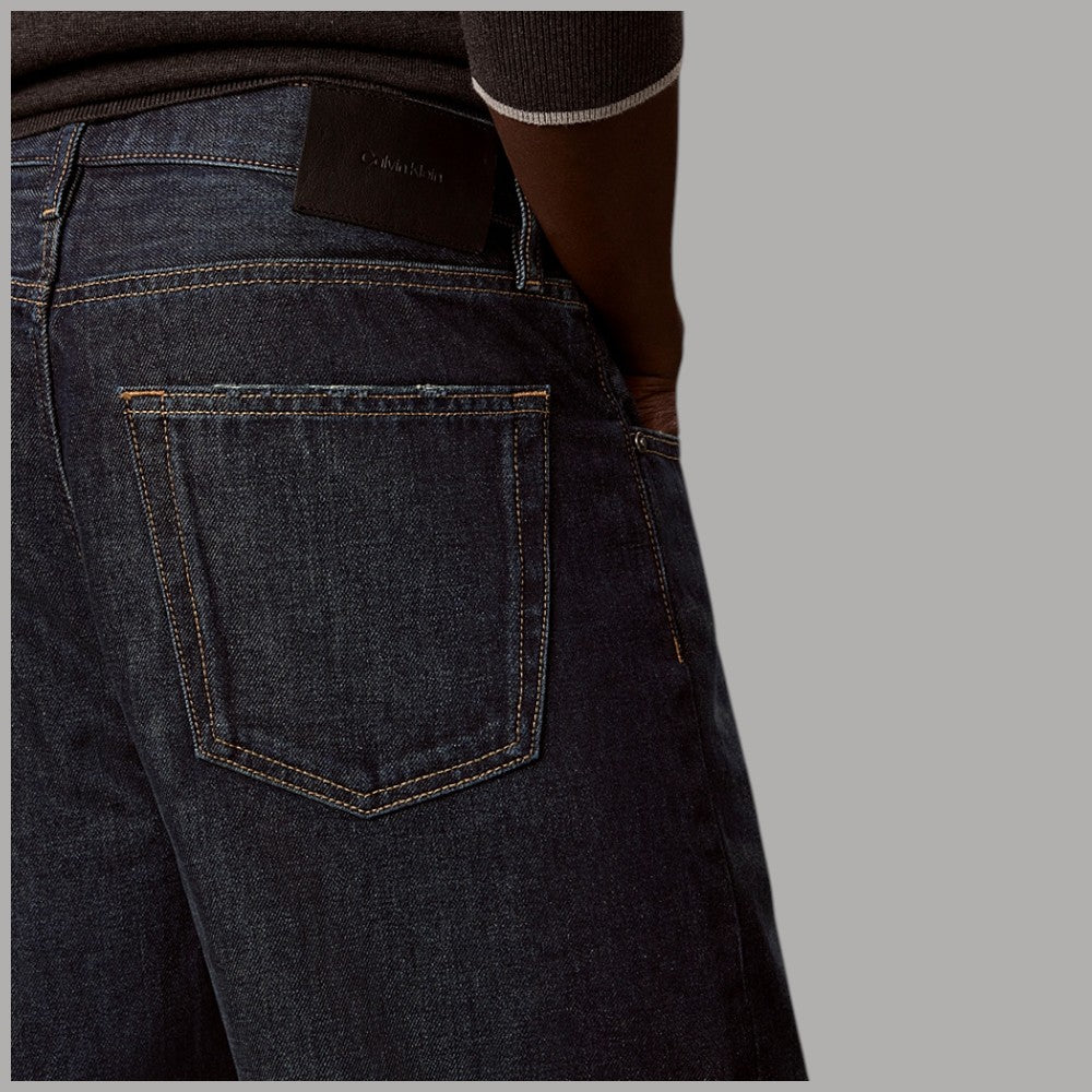 Calvin Klein Jeans da uomo Taper 90s nero con dettaglio cuciture gialle