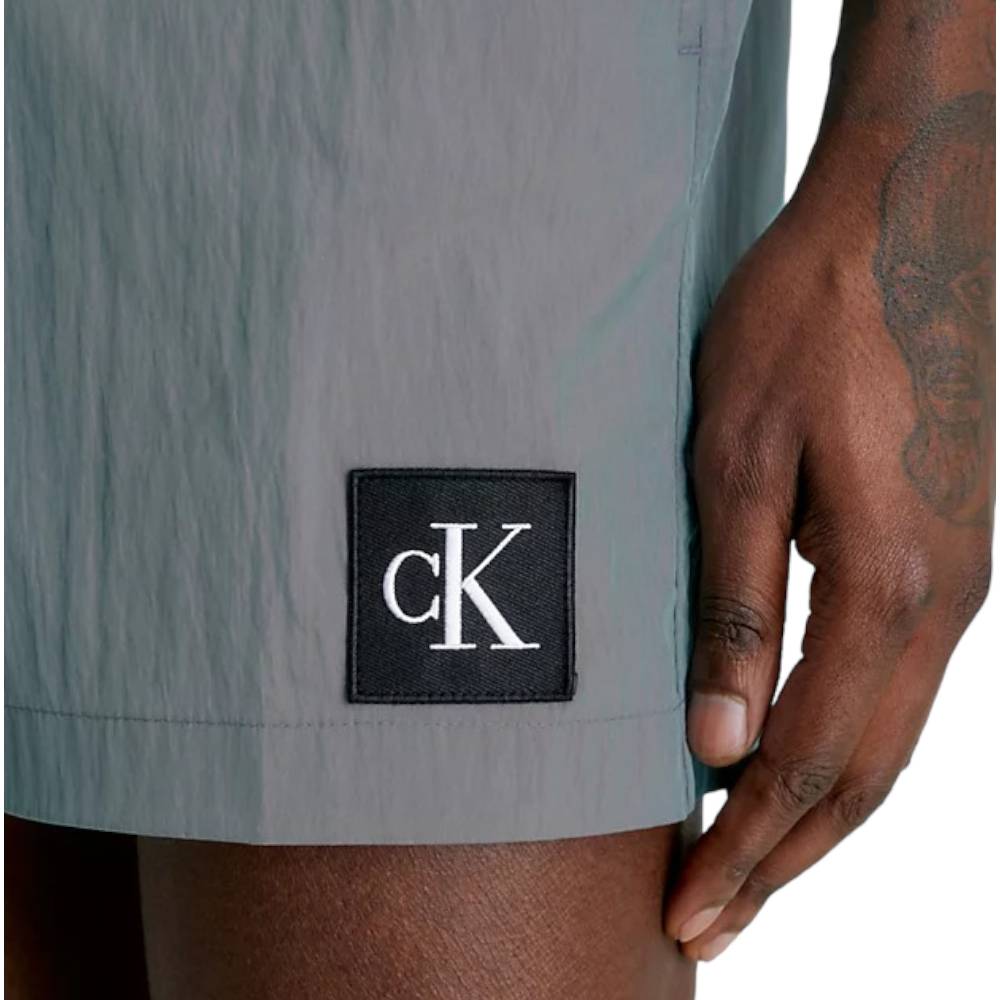 Calvin Klein costume pantaloncino grigio metal KM0KM00819 - Prodotti di Classe