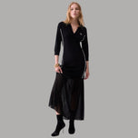 Abito lungo Liu Jo nero in maglia con scollo a V, profili chiari e gonna in georgette
