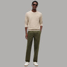 Pullover strutturato in cotone Tommy Hilfiger crema con logo tascabile sul petto