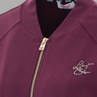 Liu Jo felpa scuba bordeaux con logo strass sulla chestiera e dettaglio zip frontale