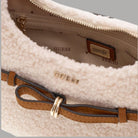 Guess borsa mini hobo effetto teddy beige con logo triangolare