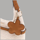 Borsa mini hobo Guess Taylor beige effetto teddy con logo