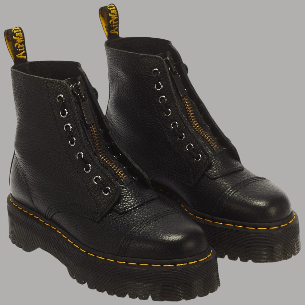 Stivali platform in nappa lavorata Dr Martens Sinclair neri con zip frontale e dettaglio giallo