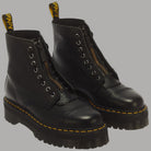 Stivali platform in nappa lavorata Dr Martens Sinclair neri con zip frontale e dettaglio giallo