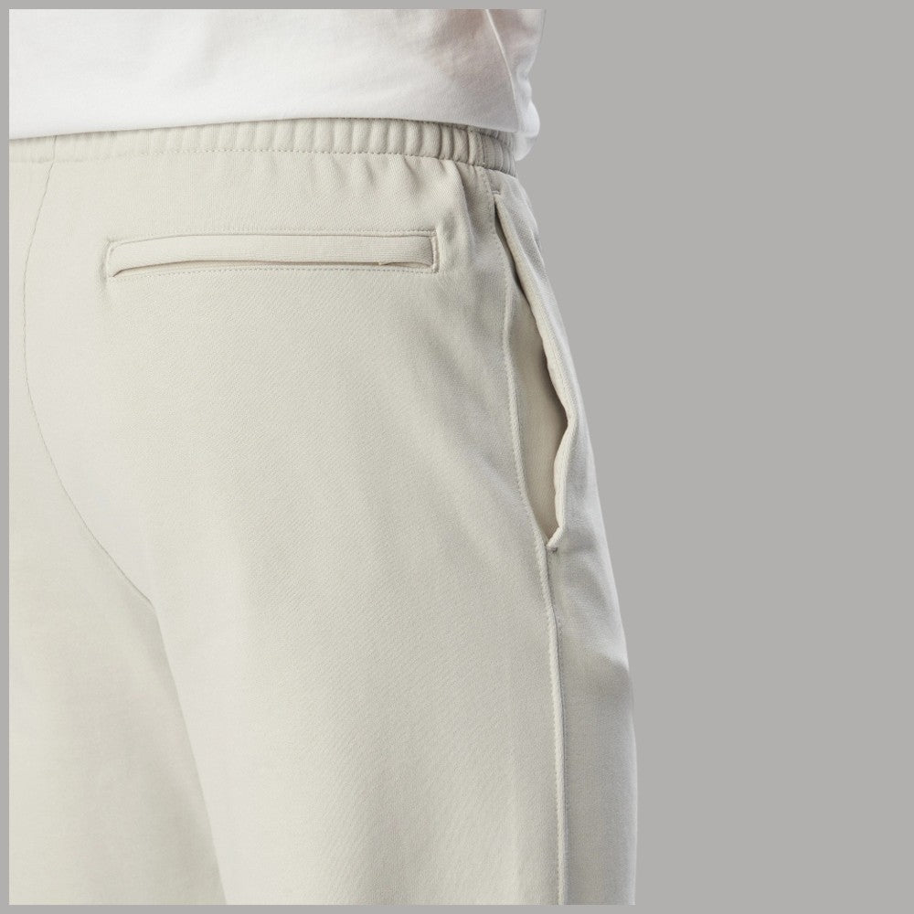 Pantaloni tuta Calvin Klein con logo grafico LV04LG212G colore beige con tasca posteriore a filo