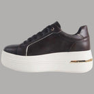 Sneakers da donna marroni con profili bianchi e suola rialzata piatta