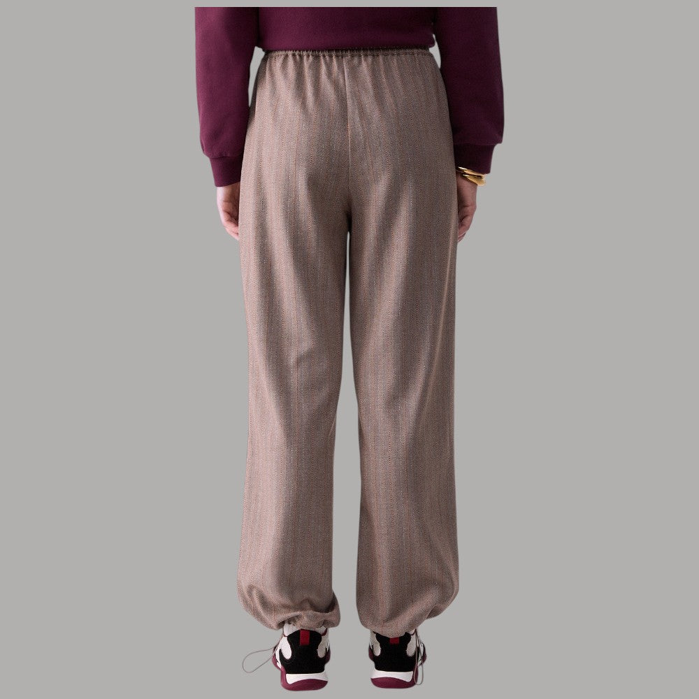 Pantaloni regular fit Liu Jo TF6148T692A beige con texture lucida e elastico in vita