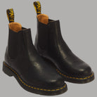 Stivaletti Chelsea Dr Martens 2976 in pelle nera con suola gialla e dettaglio elastico