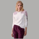 Liu Jo Maglia jacquard con dettaglio floreale bianca con fiori viola e nero, texture jacquard