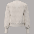 Cardigan Guess Nina lavorato a maglia beige con dettagli a trama geometrica e polsini a coste