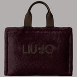 Borsa tote grande in pelliccia bordeaux con manici e logo Liu Jo frontale.