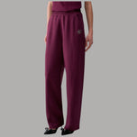 Pantaloni Liu Jo color melanzana in scuba, gamba ampia, vita elasticizzata e logo laterale