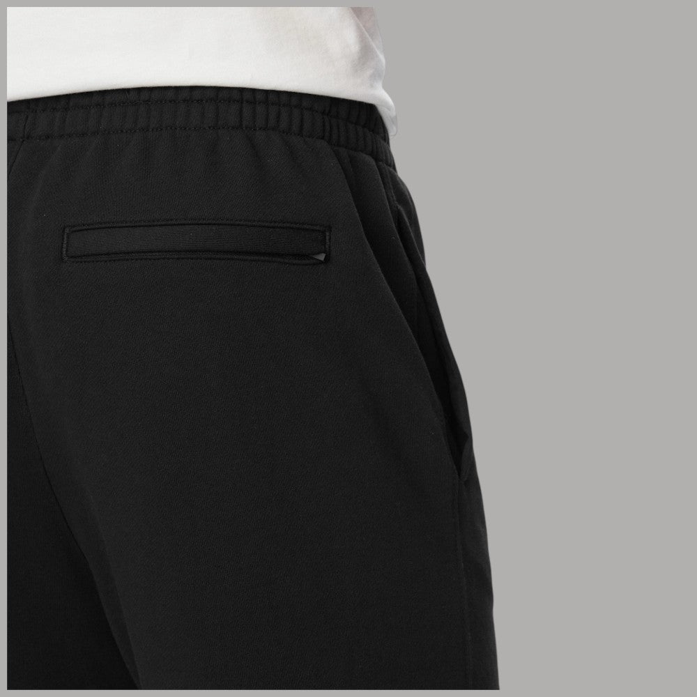 Calvin Klein pantaloni tuta neri con logo grafico LV04LG212G, dettaglio tasca con zip, vista laterale