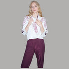 Liu Jo maglia jacquard floreale bianco rosa tinta unita dettagli texture fantasia