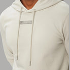 Felpa cappuccio Calvin Klein con logo centrale LV04RG276G in beige.
