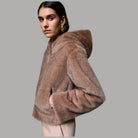 Giubbotto Liu Jo reversibile in teddy marrone, con cappuccio e polsino ampio