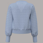 Cardigan Guess Nina lavorato a maglia azzurro con motivo rombi e dettagli a coste
