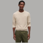 Tommy Hilfiger pullover strutturato in cotone beige con dettagli tono su tono e logo frontale