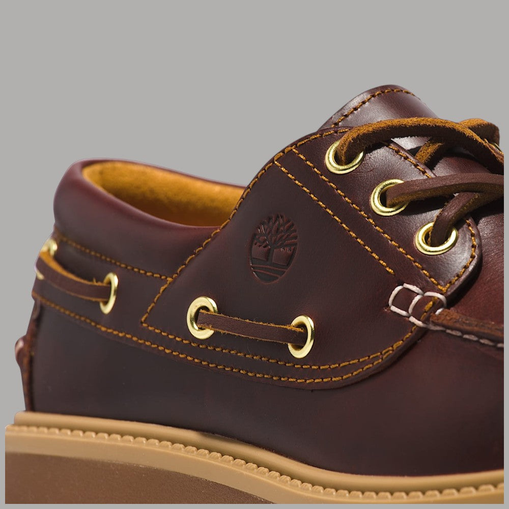 Scarpa da donna Timberland marrone con plateau, dettagli con trapuntino e occhielli in oro