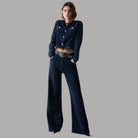 Giacca Liu Jo corta in denim blu trapuntato con strass e bottoni gioiello