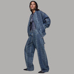 Jeans Liu Jo relaxed blu con stampa pitonata e gamba ampia