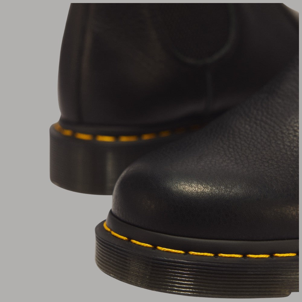 Stivaletti Chelsea Dr Martens 2976 in pelle nero con suola giallo a contrasto
