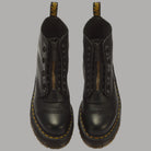 Stivali platform in nappa lavorata Dr Martens Sinclair neri con zip frontale e dettagli gialli