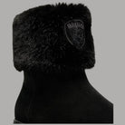 Stivaletto nero in pelle scamosciata con bordo in pelliccia e tomaia aderente