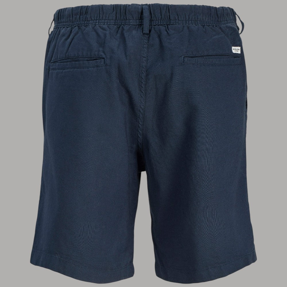 Bermuda in canvas blu scuro con elastico in vita e coulisse, tasche posteriori.