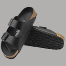 Ciabatte Birkenstock Arizona nere con suola posteriore testurizzata e bordi in sughero