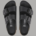 Ciabatte Birkenstock Arizona nere: vista plantare con stampa e fibbie