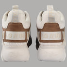 Sneakers vegan con plateau beige e inserti marroni, tallone con logo.