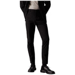 Pantaloni slim neri con tasche laterali e passanti per cintura
