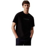 T-shirt nera Calvin Klein con stampa logo sul petto, maniche corte.