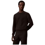 Maglione nero testurizzato con scollo rotondo, maniche lunghe