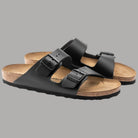 Ciabatte Birkenstock Arizona nere in pelle con doppie fibbie e suola spessa