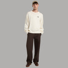 Maglione in cotone ecru con girocollo a coste, maniche lunghe e logo ricamato